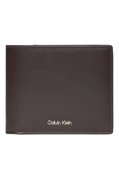 CALVIN KLEIN LVDG RAISED BI en color YG  (1)