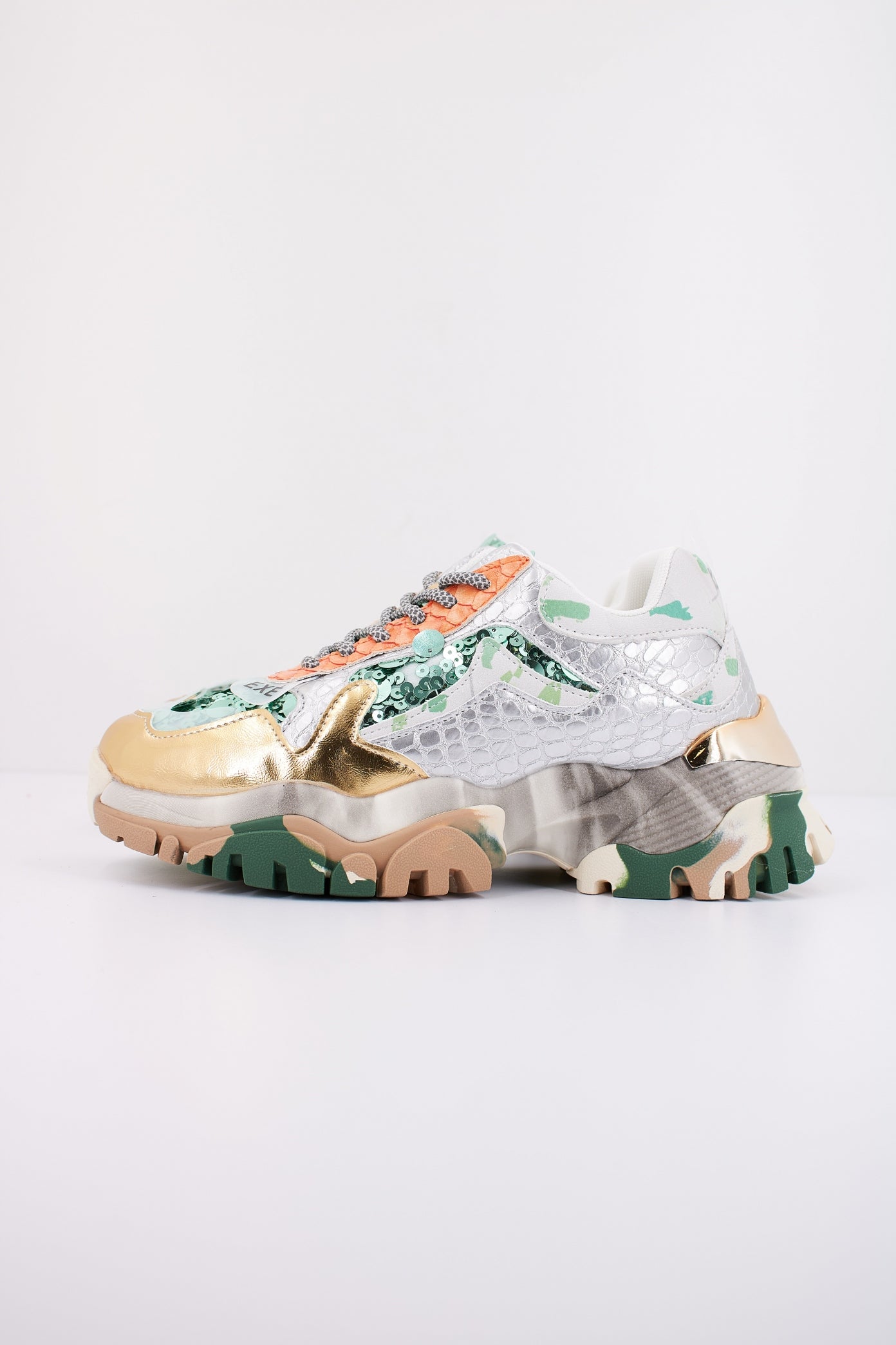 EXÉ E E PU en color GRNGLD  (1)