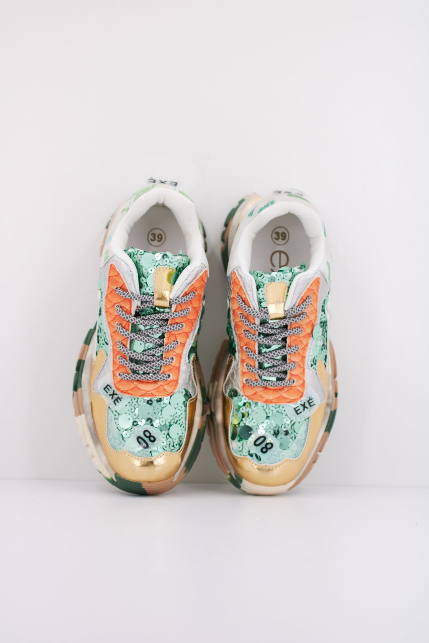 EXÉ E E PU en color GRNGLD  (3)