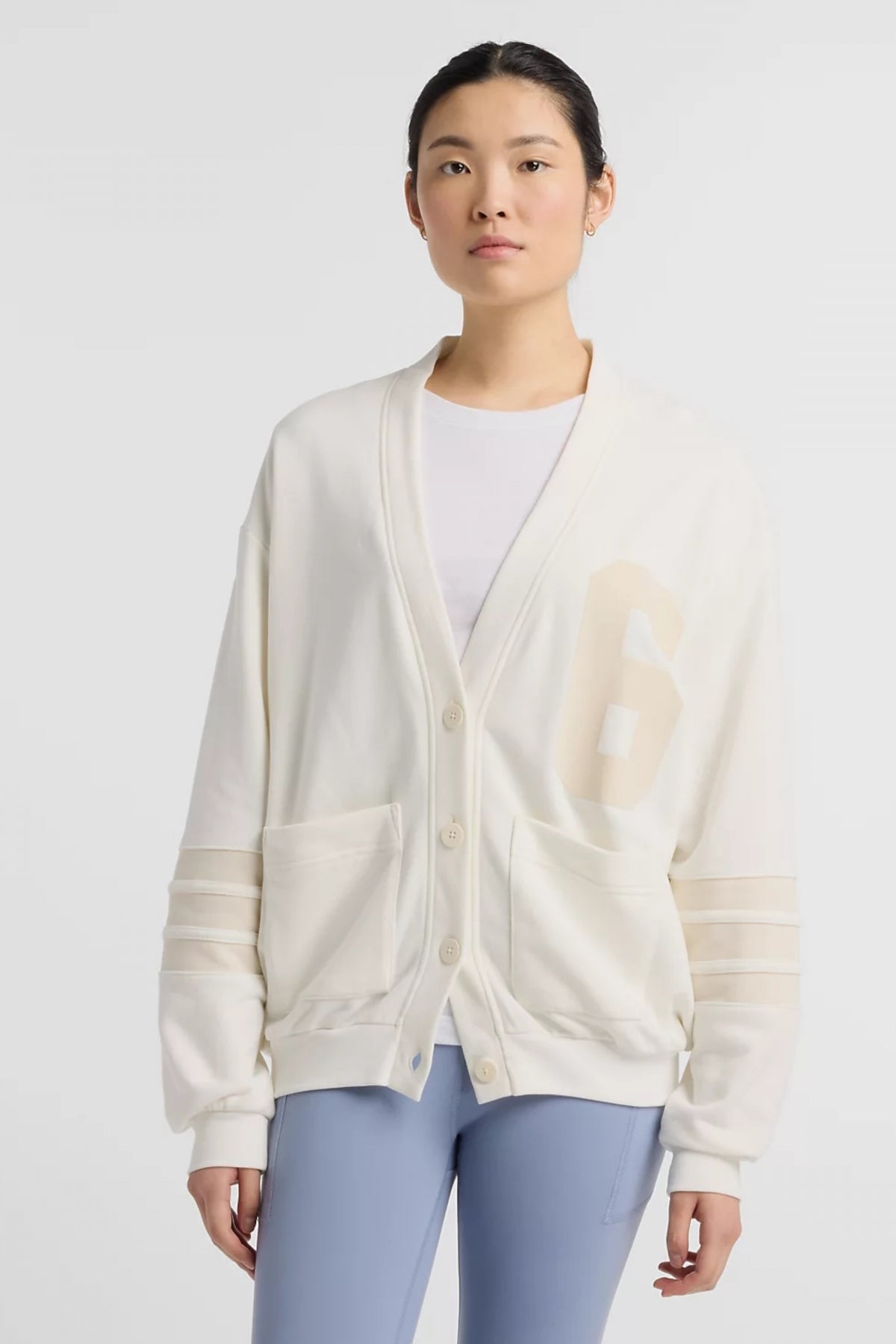 NEW BALANCE COASTAL FLEECE CARDI en color SST  (1)