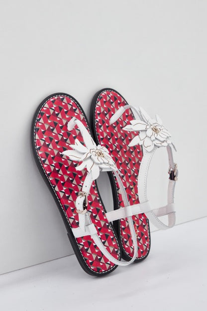 TOMMY HILFIGER TH GEO PRINT FLAT SA en color YBLECRU  (1)